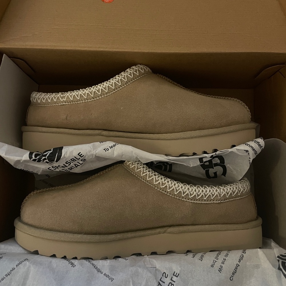 Ugg Tasman in color Mustard Seed. New in box, never worn.